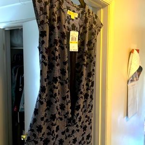 Brand new black and white Michael Kors jumpsuit.